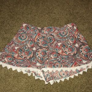 patterned flowy short with crochet detailing